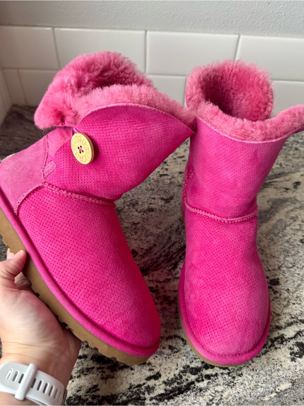 Vintage UGG Bailey Button Perforated in vibrant Pink. Size 6.